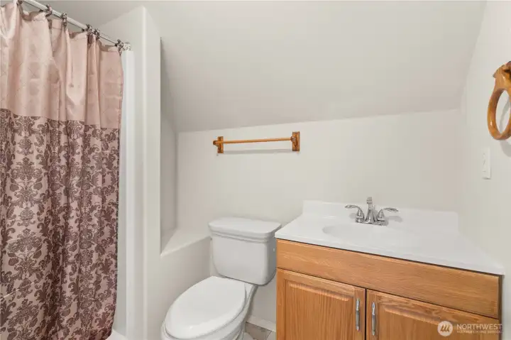 Bathroom in bonus area above garage.