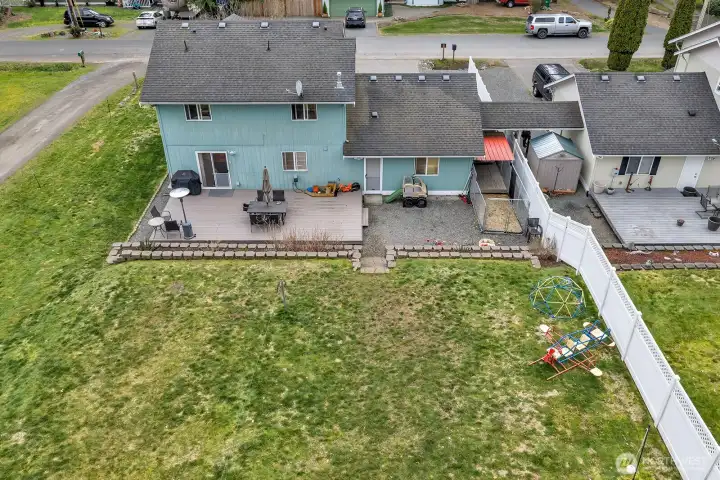 Deck, patio entertaining area and huge yard