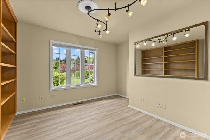 Office featuring beautiful built-in shelving