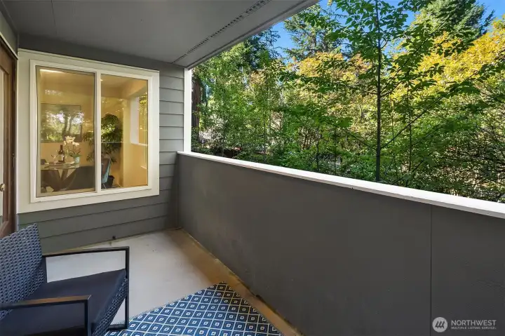 Covered balcony offering additional living space.