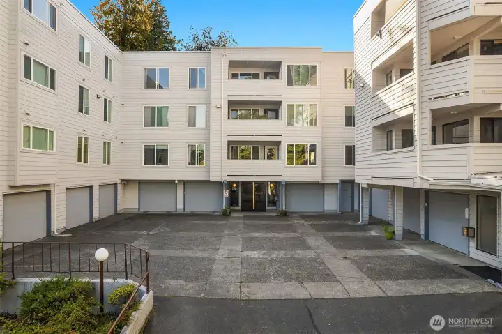 The Garden Condominium complex entry and garage access.