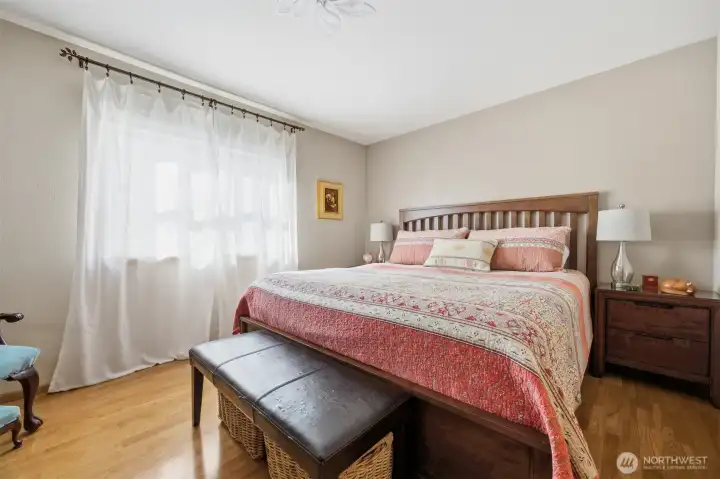 The primary suite is privately situated off the kitchen and near the laundry room.