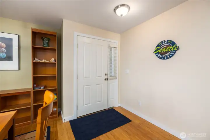 The entry; enter to easy-care bamboo flooring, and a spacious dining area with tons of storage shelves for your beachcombing treasures, games for game night, and your vacation book library.