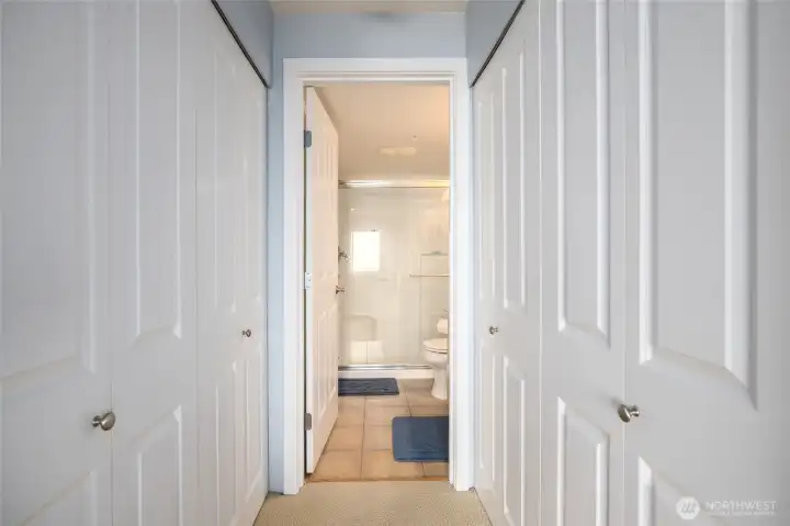Double closets in the primary suite offer plenty of space for all your suits - your work suits and bathing suits.