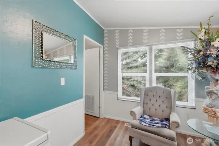 Casual dining area off the kitchen or use as a reading area, craft area, work-out area - you decide. Door to the left leads to the utility room with a back door access.