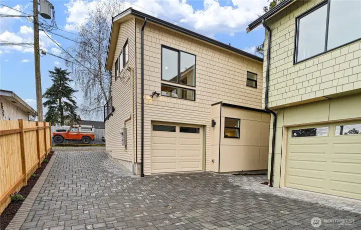 Enter from the alley and park in your own private garage.
