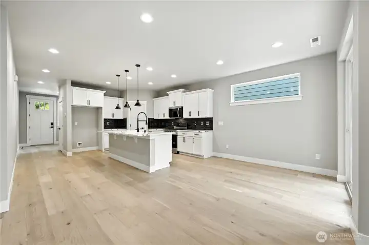 photos of same plan built on a different lot. Details will vary