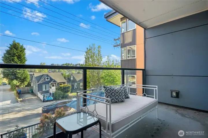 The covered deck accessed from both bedrooms—perfect for relaxing year-round. Note, there is another deck off the living room.