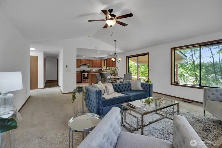 Living room and kitchen and hallway to entrance and bedrooms