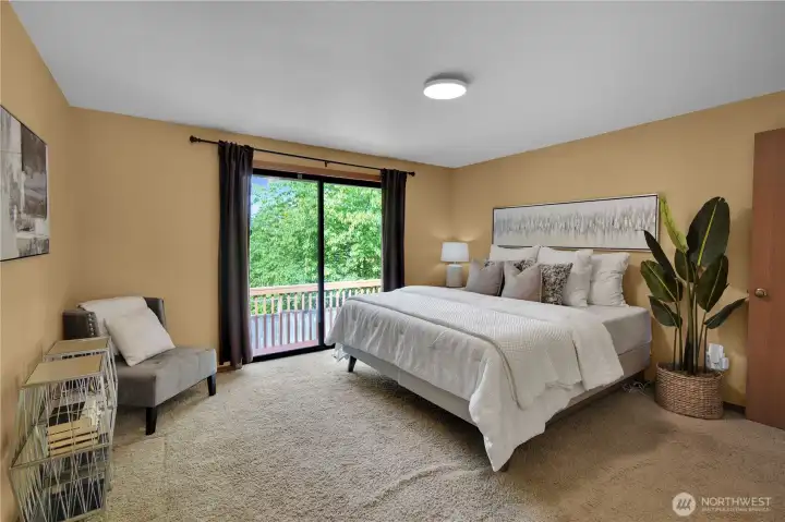 Primary room with slider to back deck