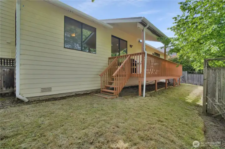 Back view of home and back yard