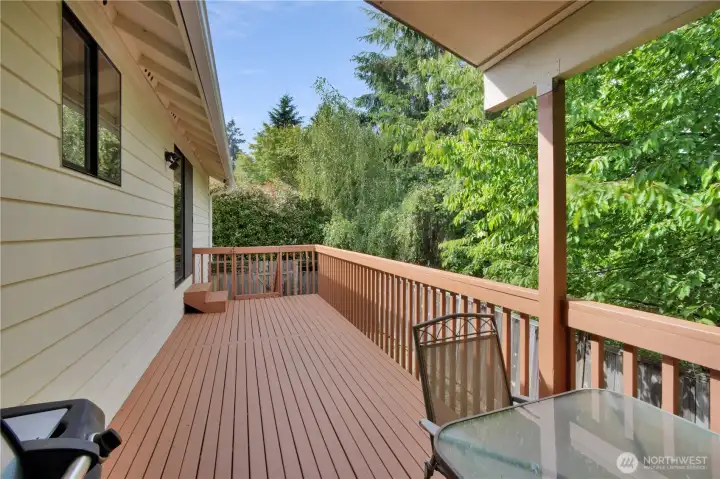 View of deck from dining to primary bedroom