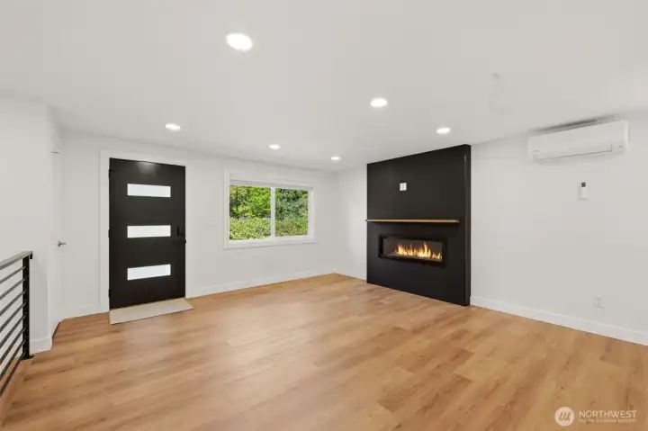 Enter in on the main floor to an open concept family room, dining & kitchen.