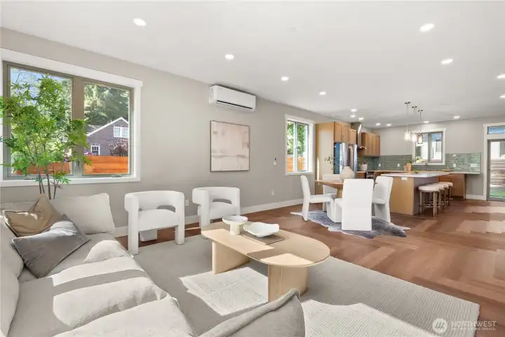 This room flows seamlessly into the dining area and kitchen This room flows seamlessly into the dining area and kitchen