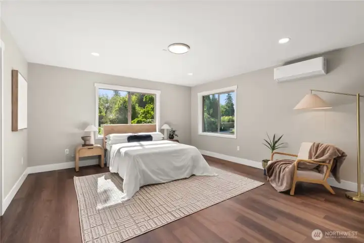 Primary bedroom oozes luxury and comfort. All windows in the home are energy efficient, noise reducing triple pane windows. Primary bedroom oozes luxury and comfort. All windows in the home are energy efficient, noise reducing triple pane windows.