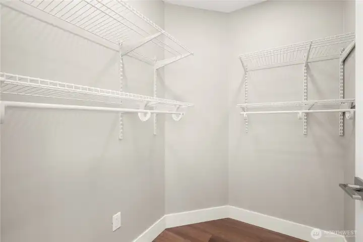 Walk in primary closet features tons of space for your clothes Walk in primary closet features tons of space for your clothes