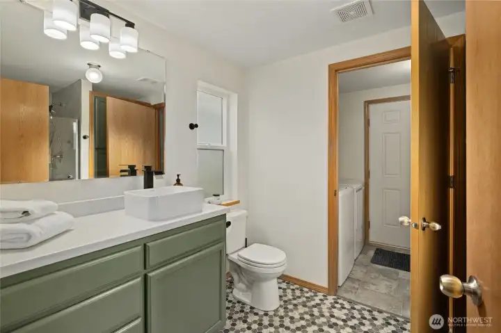 Beautiful bathroom with new light and vanity fixtures. Beautiful bathroom with new light and vanity fixtures.