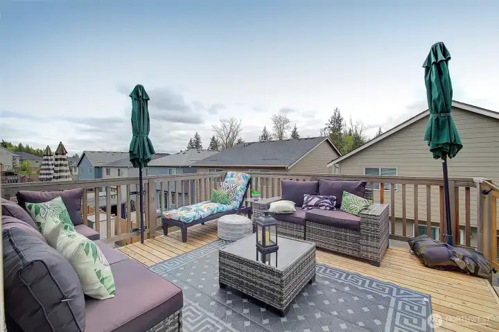 An expansive upper deck creates additional space for dining, relaxing and entertaining outdoors.