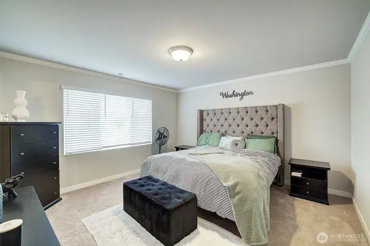 Spacious primary suite with room to relax and recharge.