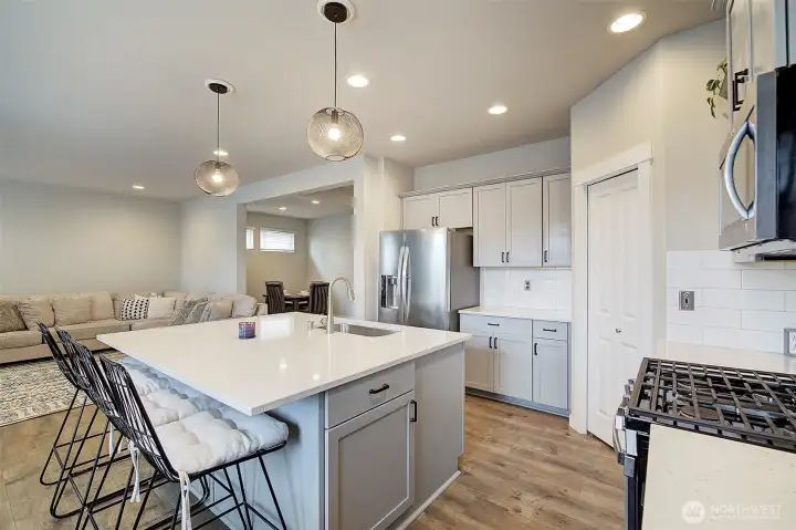 Thoughtful flow between the kitchen and casual dining space.