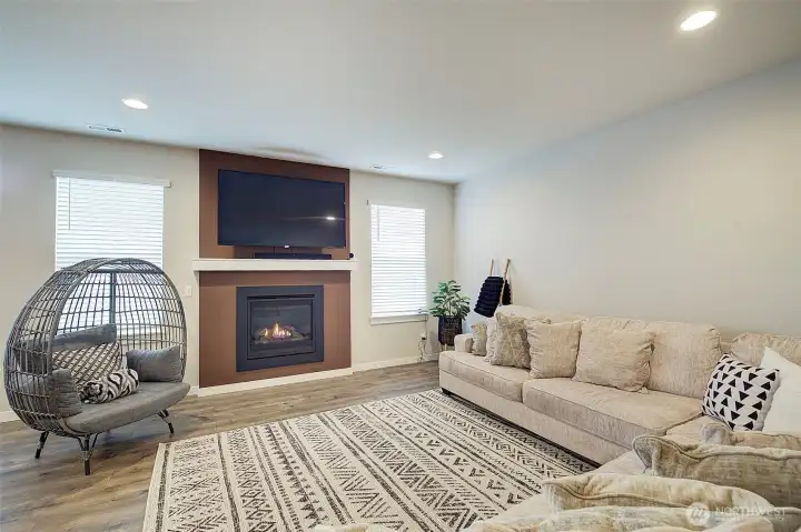 Bright comfortable living with room for everyone to gather.