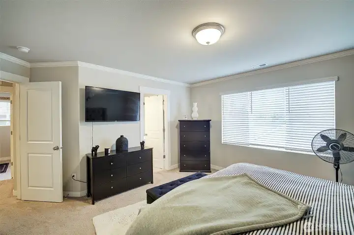 A peaceful primary retreat with generous proportions and natural light.