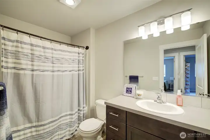 Modern, functional finishes continue through out home.