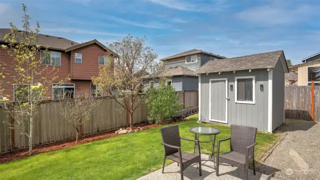 Step outside to this lush yard with patio & shed (built in 2018).