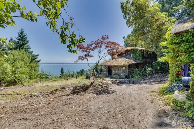 This is the view upon entering the north end of circular driveway water side of SE Camano Dr.