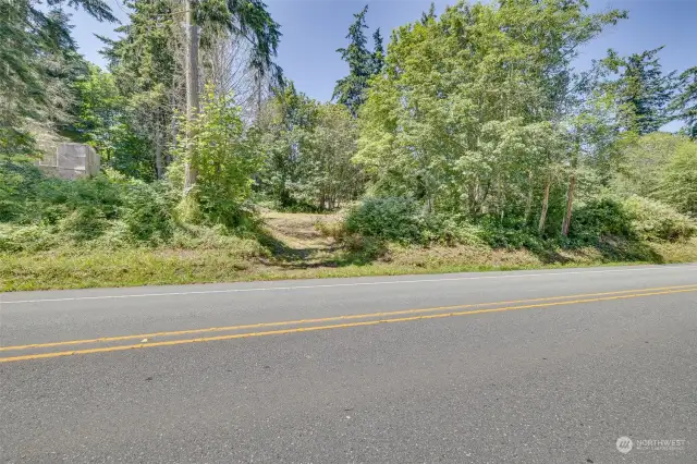 A view from the east bluff side looking toward the west side driveway area.