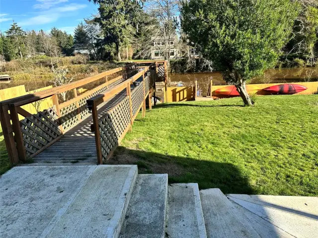 Concrete steps leading to the back yard