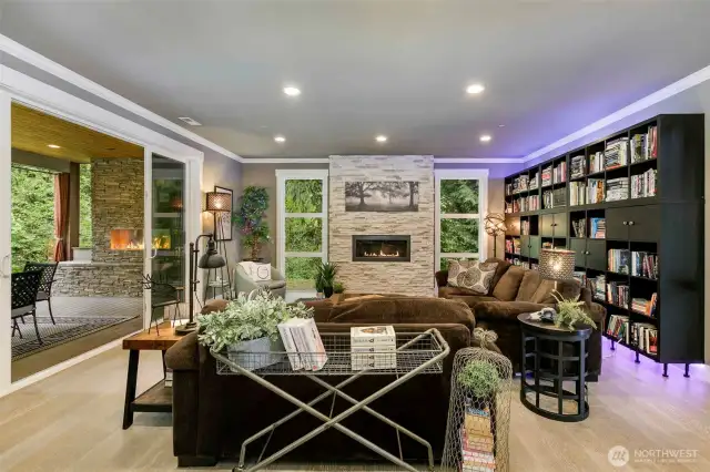 Fabulous living room opens to deck with built-in barbecue and fireplace.
