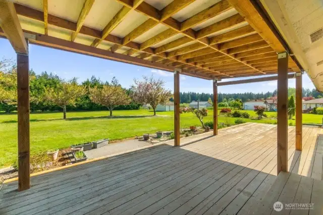 Covered deck overlooking the back.