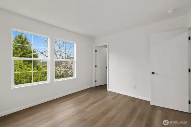 This secondary bedroom also features a walk-in closet!