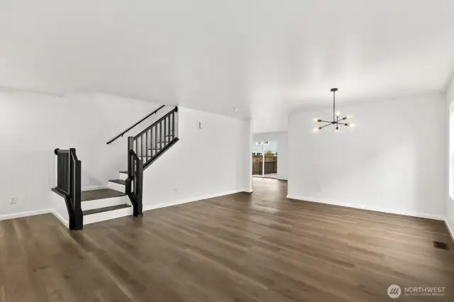 Another perspective of the open-concept living and dining areas.