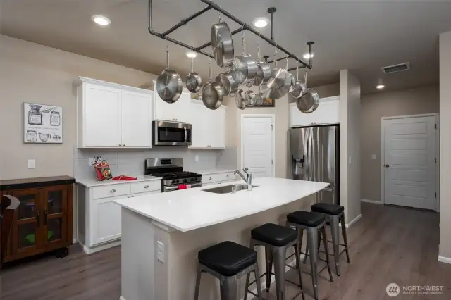 Custom hanging storage for pots and pans.