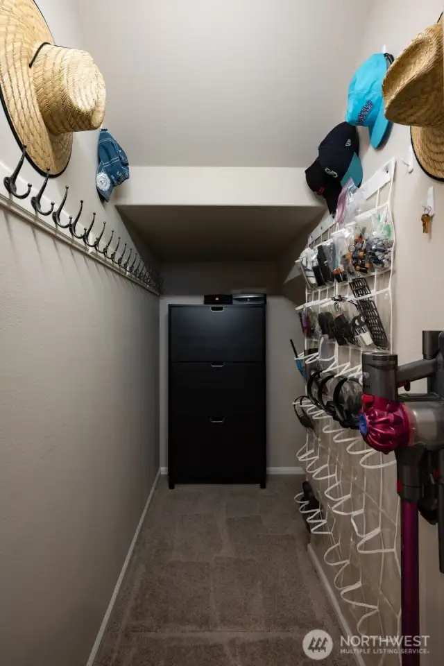 Large main floor closet with lots of storage, organizer for misc. items.