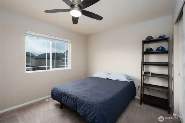 Large 2nd Bedroom with ceiling fan.