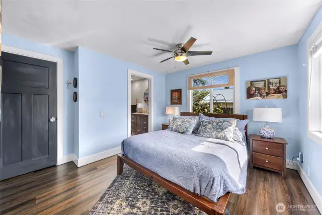 Primary bedroom with walk-in closet behind the blue door