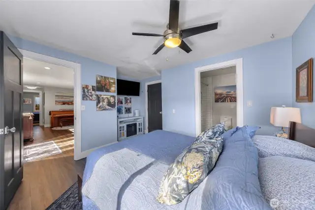 Newly remodeled primary bathroom suite to the right