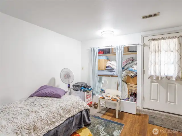 A bedroom on main floor, used by staff. Could be used as 6th bedroom.