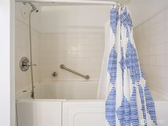 Walk-in tub/shower.