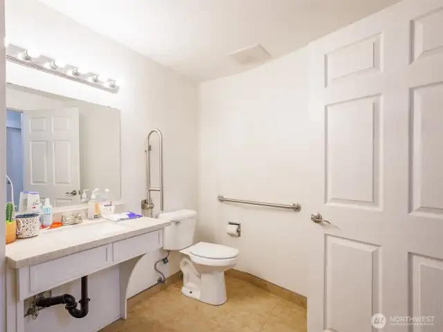 2nd main floor bathroom w/roll in shower