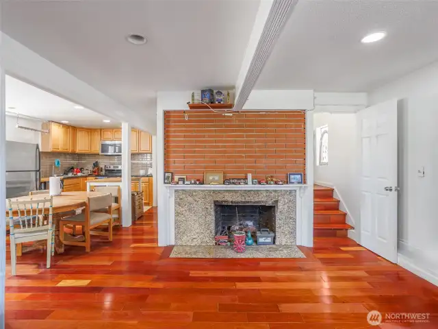 Downstairs living room w/wood burning fireplace