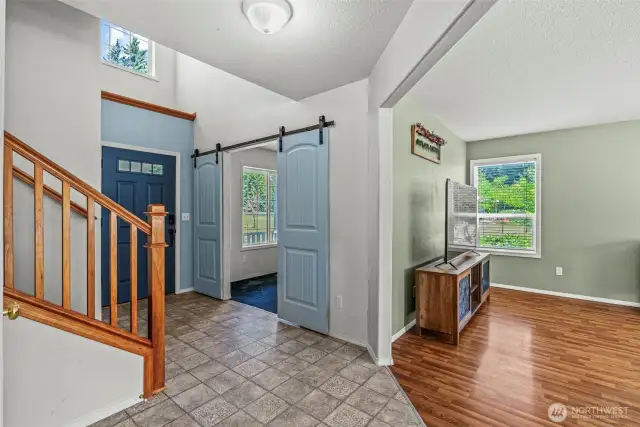 Entry with front finished room and Living Room