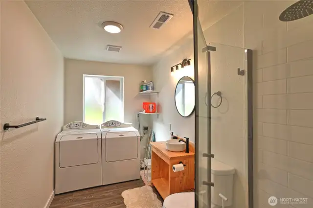 Laundry room with shower