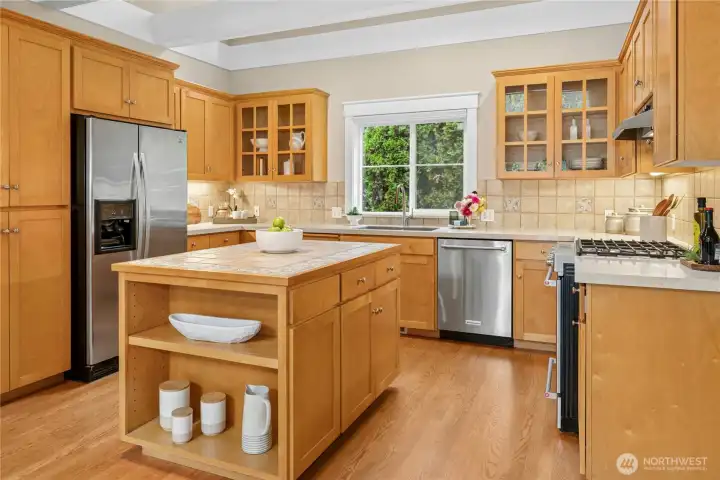 Hardwood floors extend through the kitchen, bringing warmth and quality to the smart floorplan.