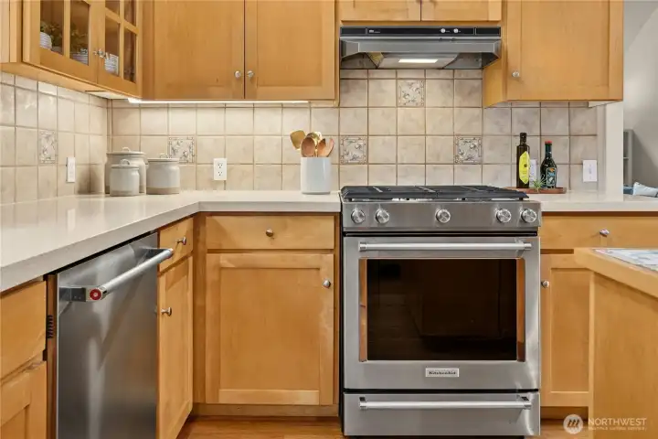 Updated counters with under cabinet lighting compliment the modern propane cooktop.