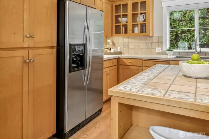 Generous storage throughout the kitchen and a sensible open layout puts meal prep at your fingertips.