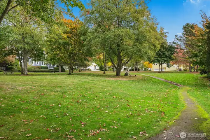 Another view across the neighborhood park, located in the center of these storybook homes.
